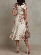 Alba™ | Elegancka satynowa sukienka midi w stylu retro z kwiatowym wzorem